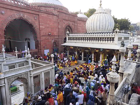 Slowly the celebrations begin to start as people take positions for the best view to witness the proceedings