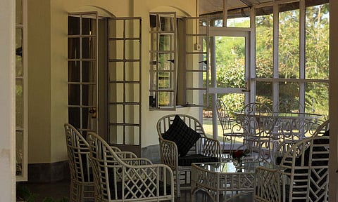 Wathai's jaali kamra with white cane chairs