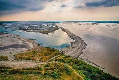 Photo: Shutterstock : The Chenab, a mix of two words: chan (moon) and aab (river), is formed by the confluence of the Chandra and Bhaga rivers