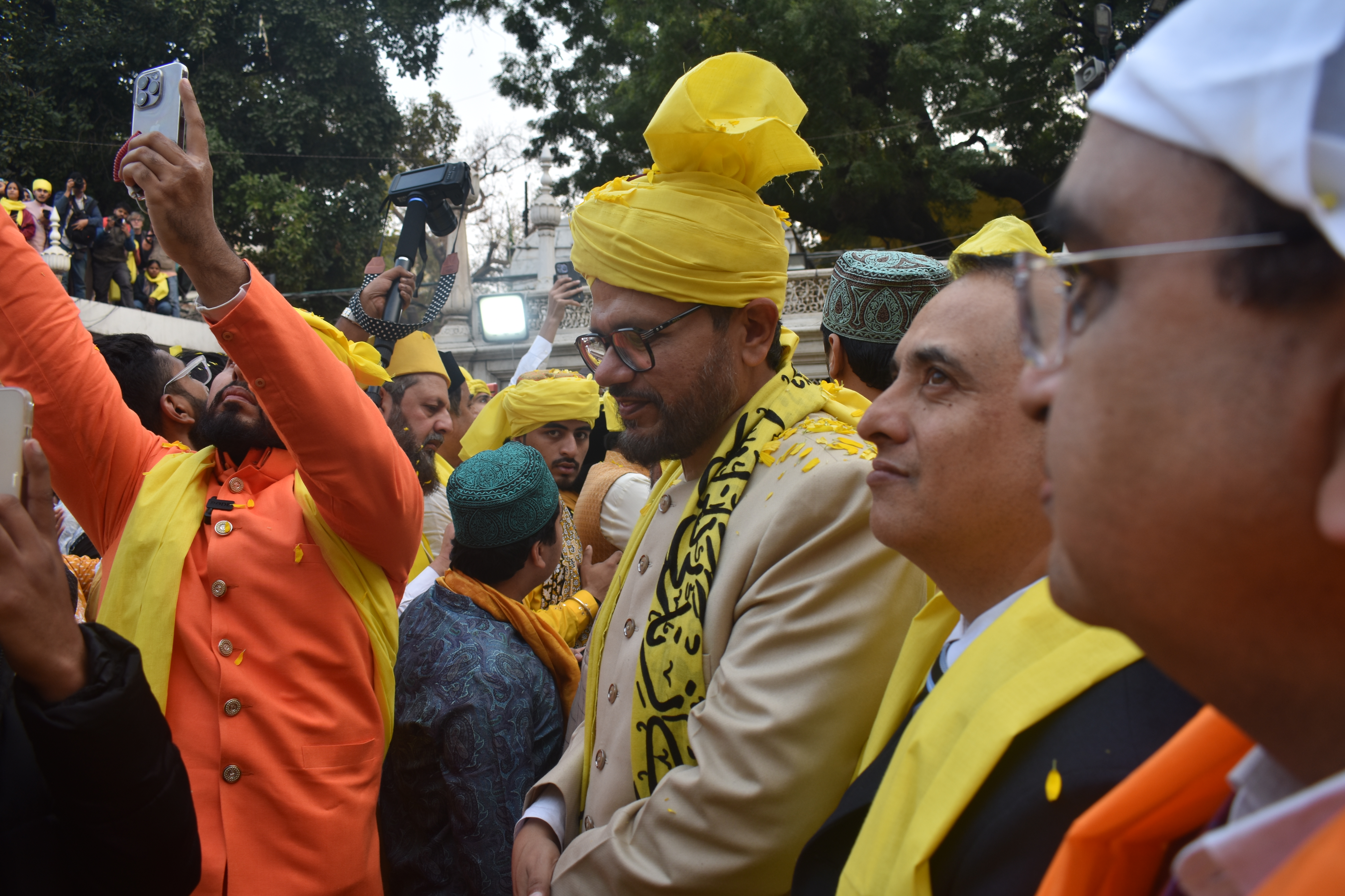 Syed Farid Ahmed Nizami, a Sajjadah Nashin, comes out and joins the qawwali session after offering a sheet (chadar) at the dargah