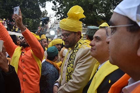 Syed Farid Ahmed Nizami, a Sajjadah Nashin, comes out and joins the qawwali session after offering a sheet (chadar) at the dargah
