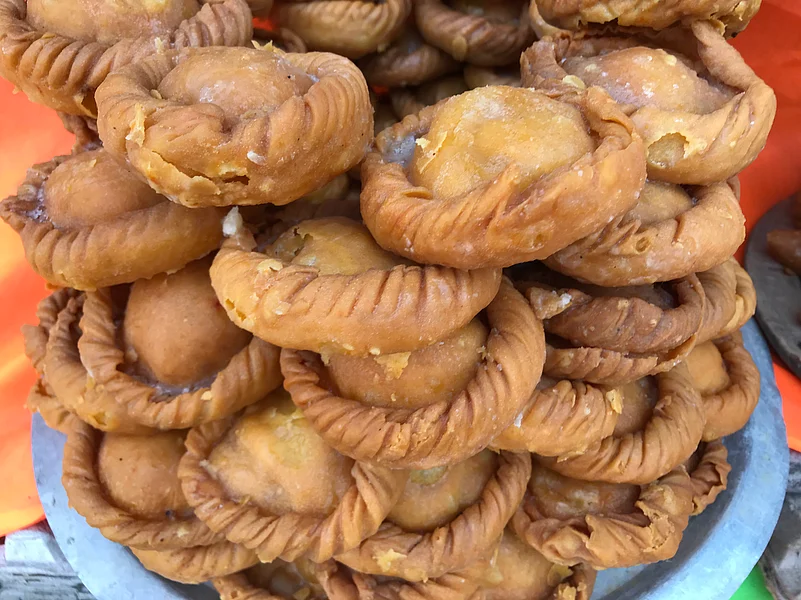 Lavang latika is a sweet dish wrapped up and closed with a clove on top