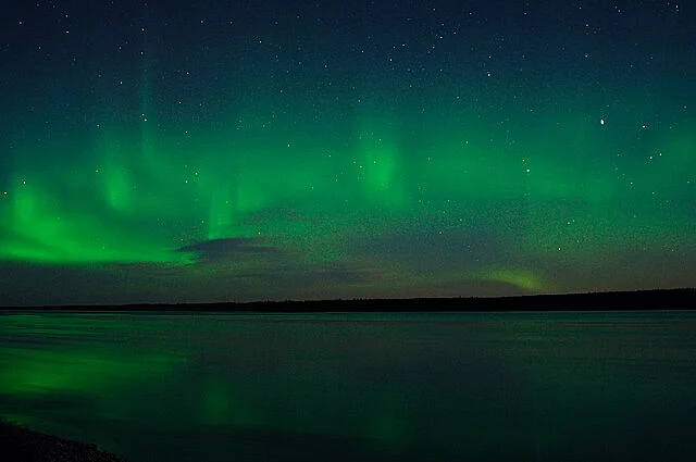 Aurora borealis glowing over Quebec in Canada