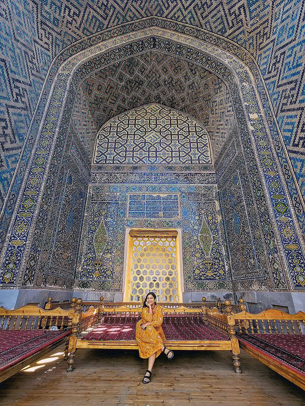The author resting in the shade of the Ulugh Beg Madrasa on a hot summer day