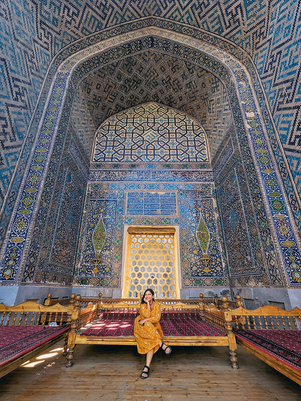 The author resting in the shade of the Ulugh Beg Madrasa on a hot summer day