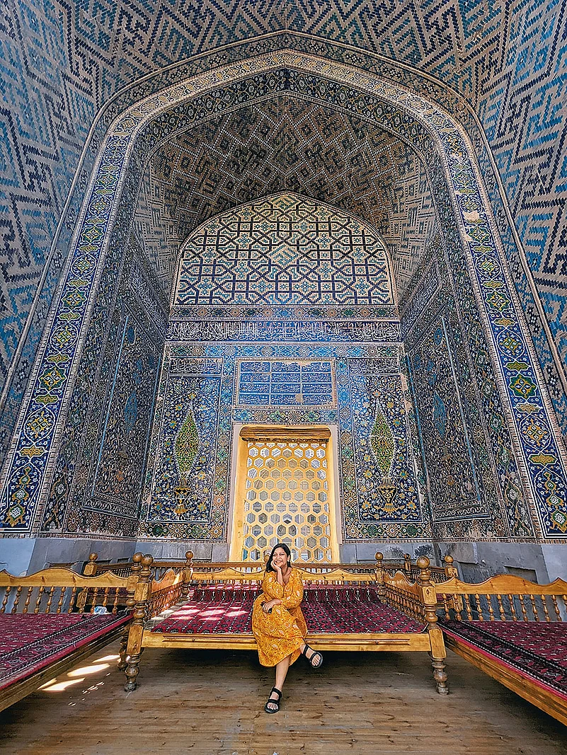 The author resting in the shade of the Ulugh Beg Madrasa on a hot summer day