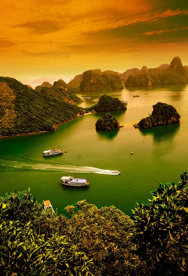 Halong Bay at sunset - Shutterstock