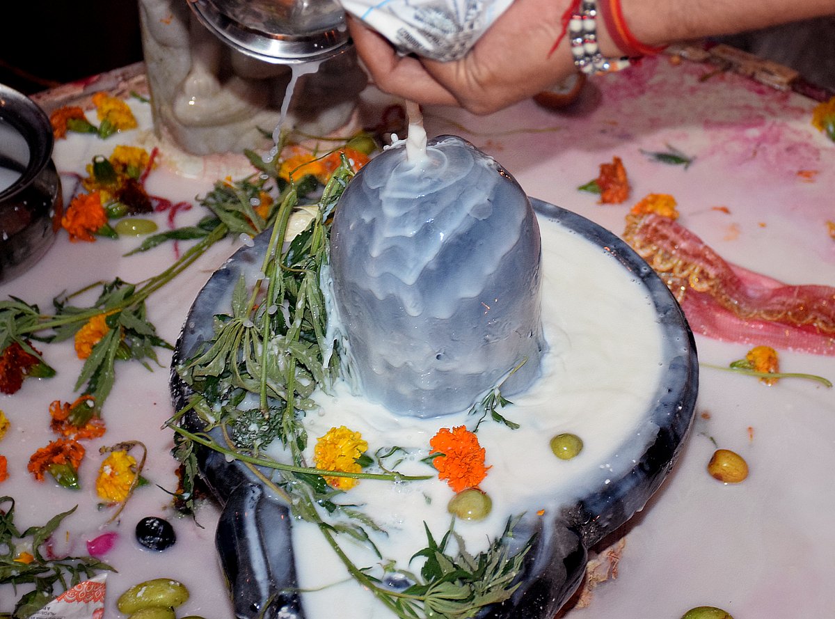 Offering milk to a lingam during Maha Shivaratri