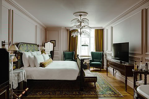 Large rooms at The Ned offer open-plan living, ideal for extended stays