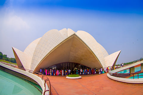 People queuing up to go inside the Lotus Temple 