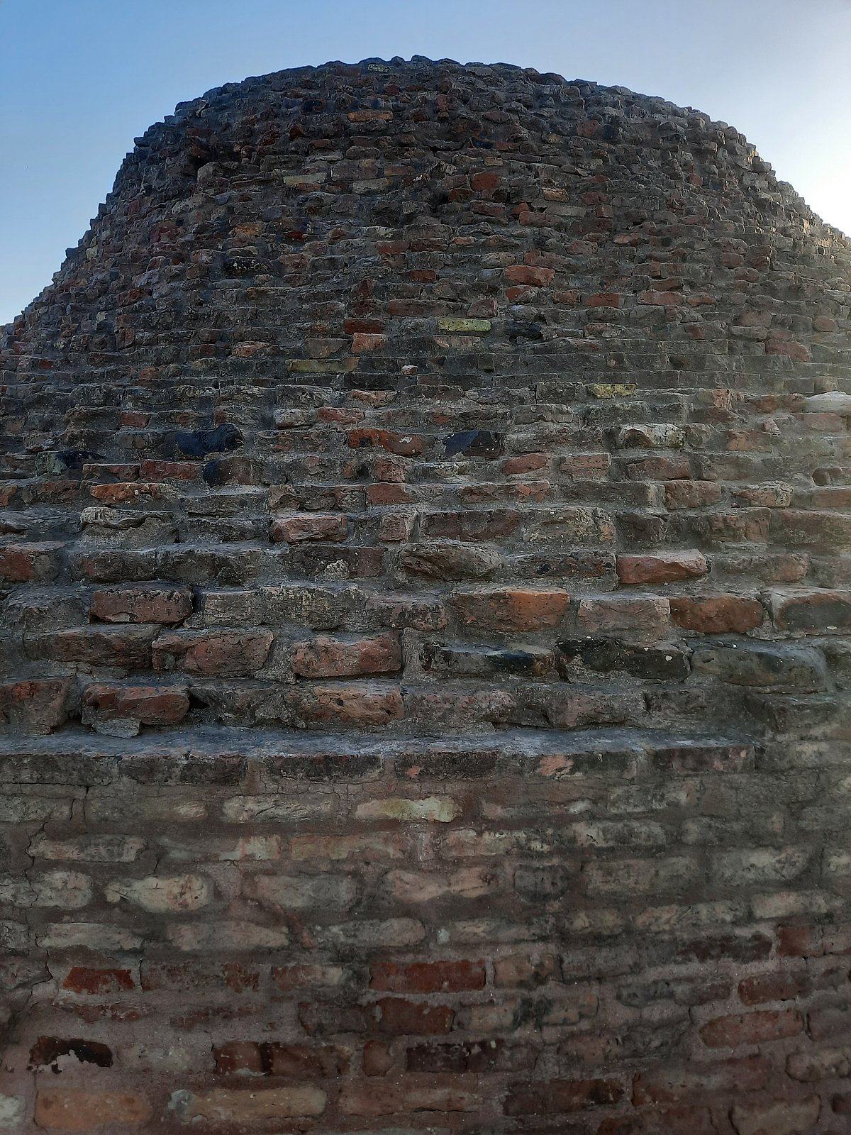 Close-up of the flat-bricked wall at Agroha Mound