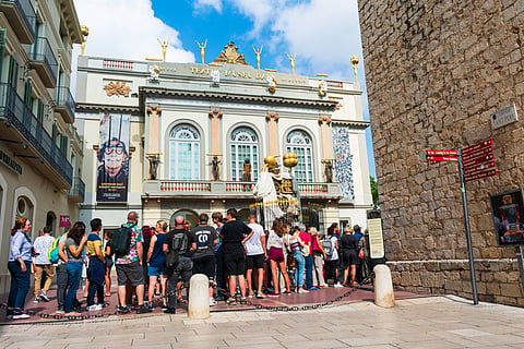 Tourists crowding up in front of a museum in Catalonia, Spain