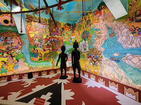 A three-dimensional mural representing the origin story of the mighty Narmada river