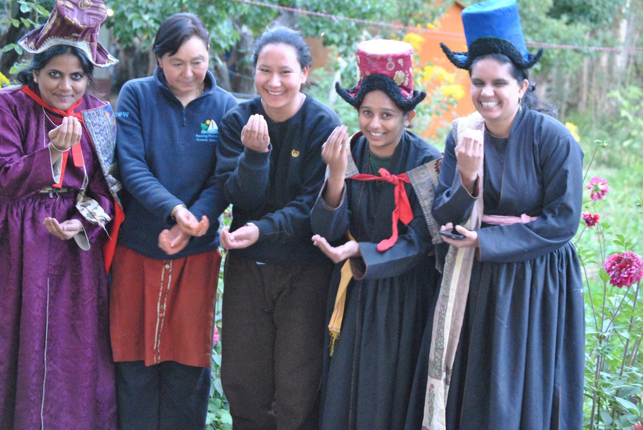 Trying out traditional Ladakhi costumes and dancing with the locals