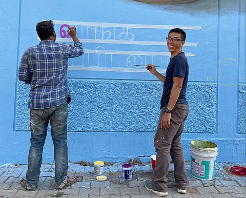 Writing 'Come, let's eat' in Tamil