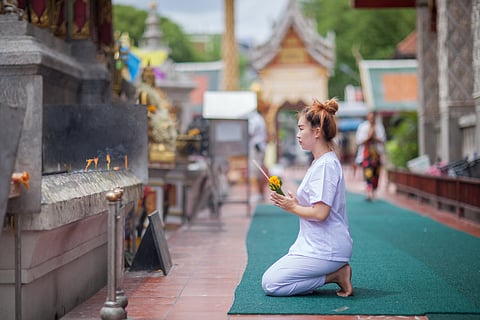 Pointing with your feet is offensive in Thailand so sit with your feet under you or cross-legged
