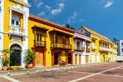Discover the timeless charm of Cartagena's Plaza de la Aduana, nestled within the UNESCO World Heritage Site of the colonial walled city