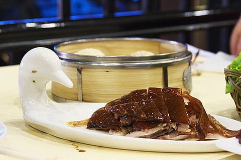 Peking Duck being served in a Bianyifang restaurant in Beijing