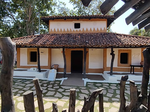 A life-size tribal house built by folk artisans