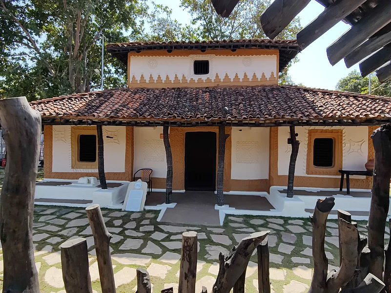A life-size tribal house built by folk artisans