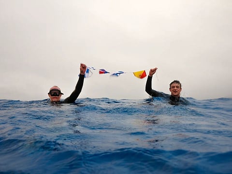 The bunting spells out N.E.M.O. in maritime flags
