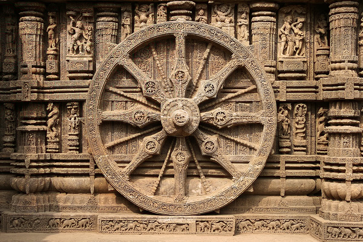 Ashwin/Shutterstock.com : Intricate carvings on a stone wheel in the ancient Surya Hindu Temple at Konark, Odisha, India