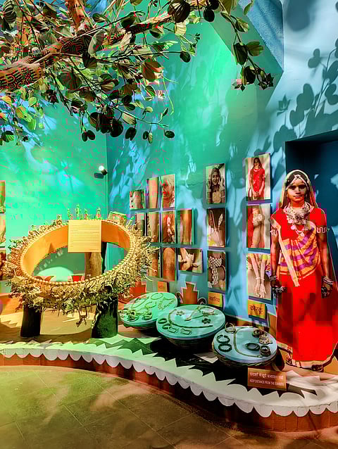 A gallery that explores tribal jewellery with a model of a ceremonial bangle gifted to a bride on her wedding day