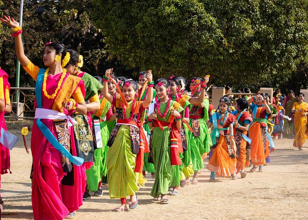 Singing and dancing is an integral part of Dol in Shantiniketan 