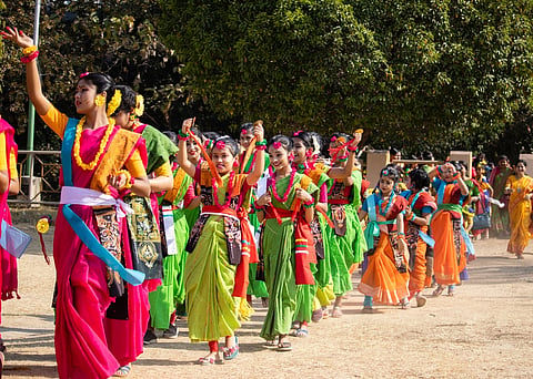 Singing and dancing is an integral part of Dol in Shantiniketan 