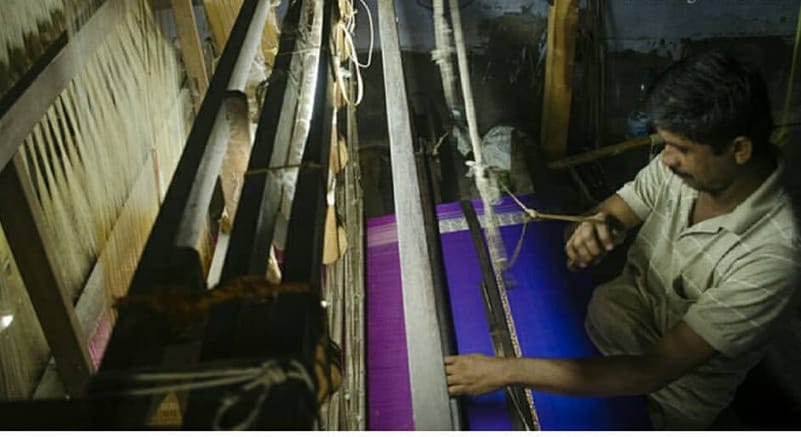A weaver working on a Murshidabad silk sari