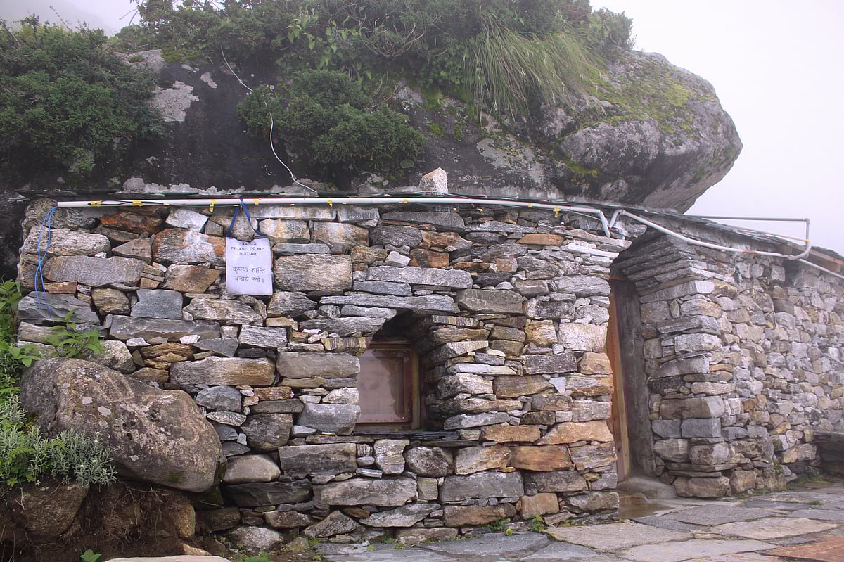 The Rudra Meditation Cave is furnished with a single bed, a washroom with geyser and running water, and a heater