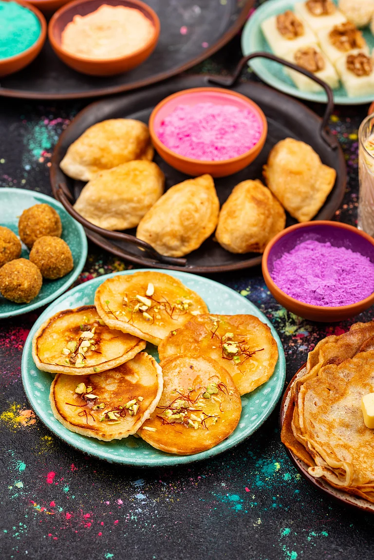 As assortment of Holi food - Shutterstock