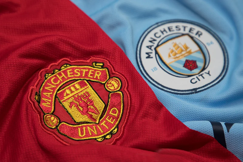 The Logo of Manchester United and Manchester City