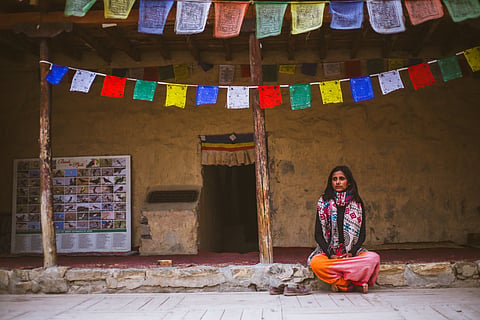Mouna sitting in a thousand-year-old monastery in Tabo village in the Spiti valley 