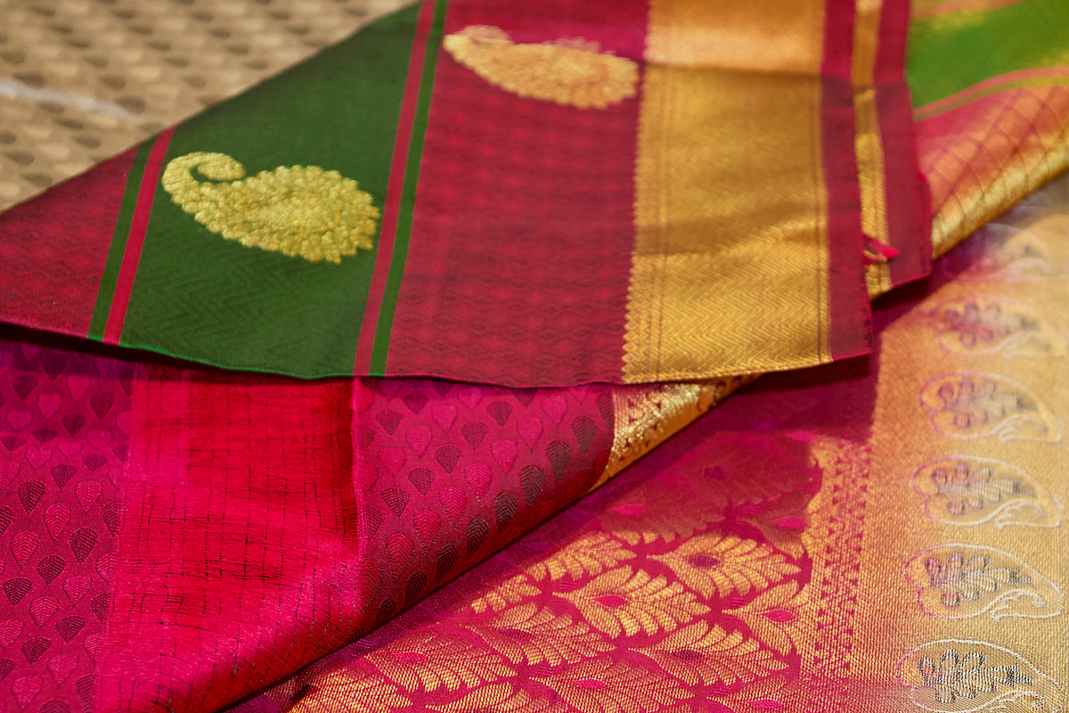 Kanjivaram silk saree with intricate craftwork on its fabric