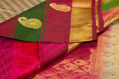 Kanjivaram silk saree with intricate craftwork on its fabric