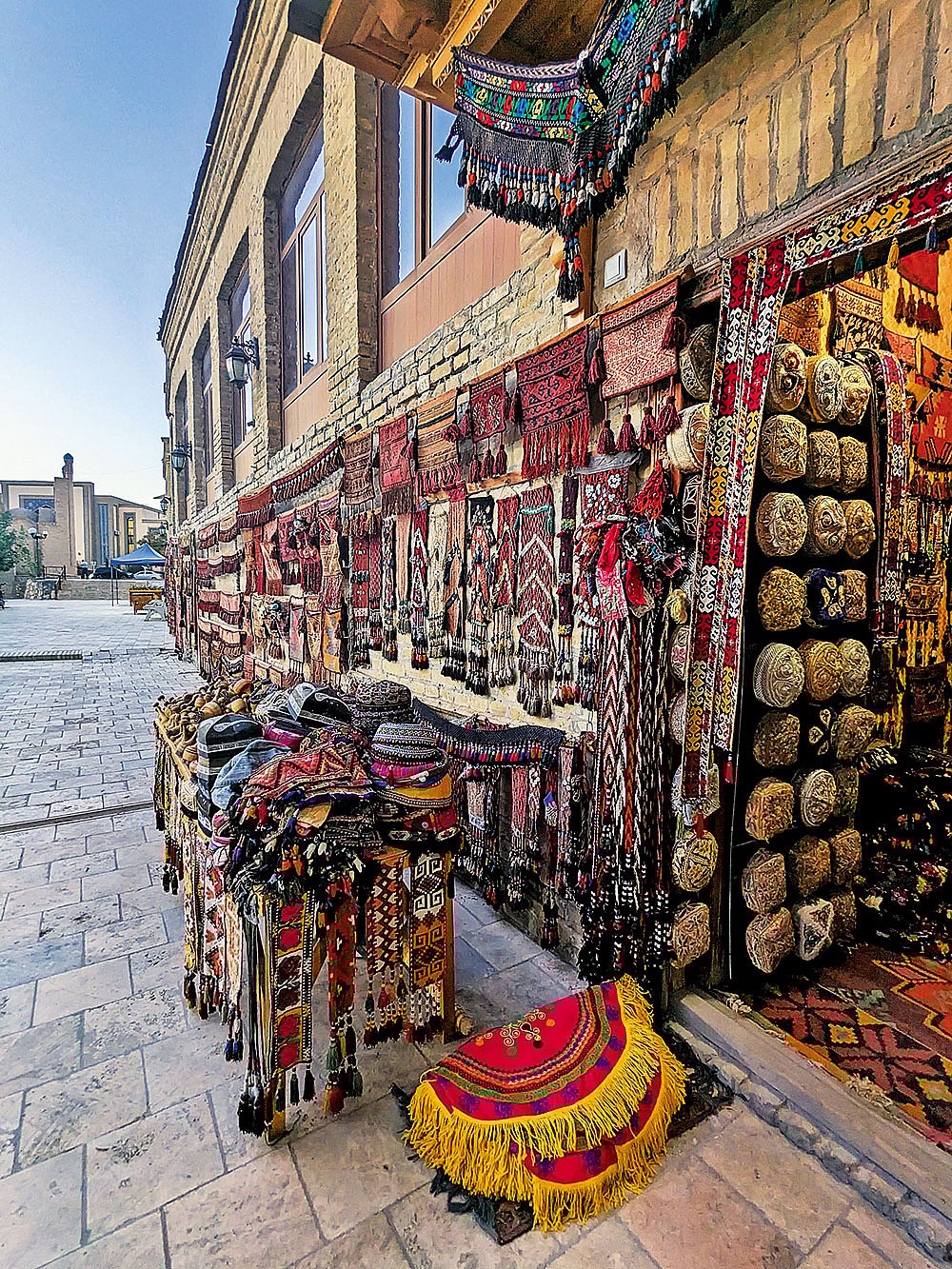 Hand-embroidered caps on display at Taqi Telpakfurushon in Bukhara