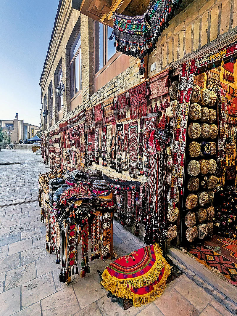 Hand-embroidered caps on display at Taqi Telpakfurushon in Bukhara