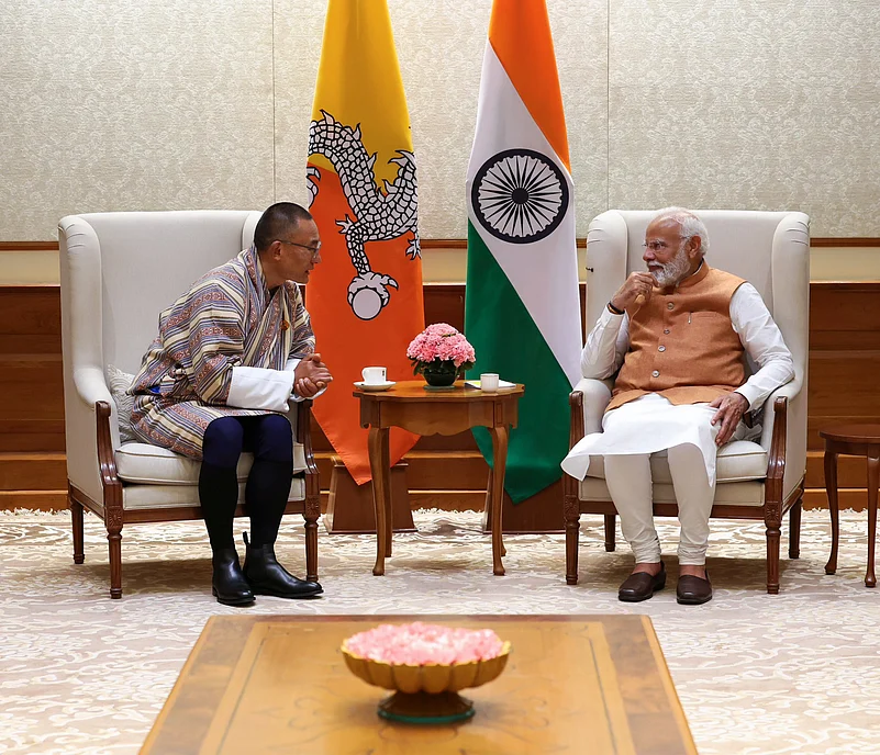 Tobgay interacting with PM Modi