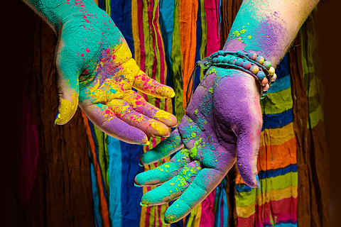 In West Bengal, devotees celebrate the divine love of Lord Krishna and Radha by smearing each other with coloured powders