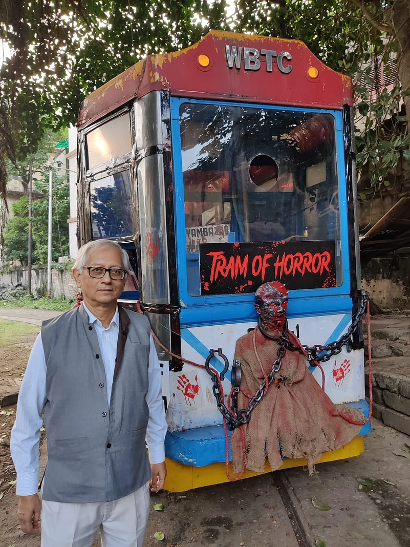 Bhattacharyya with a tram decorated by the Australian High Commission to celebrate the Kolkata International Film Festival