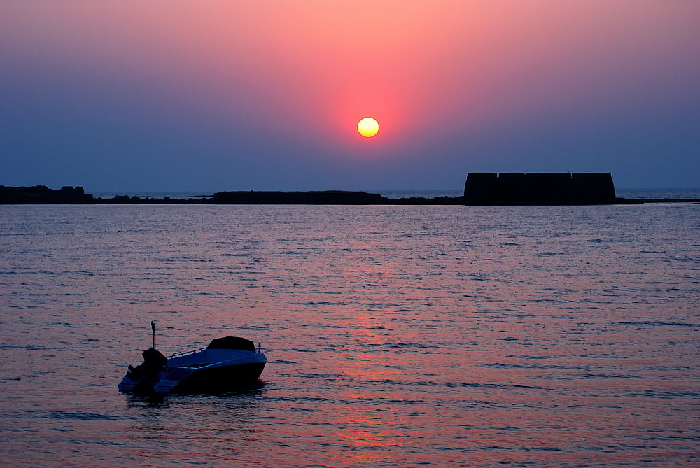 A glorious sunset behind the historical Kolaba Fort