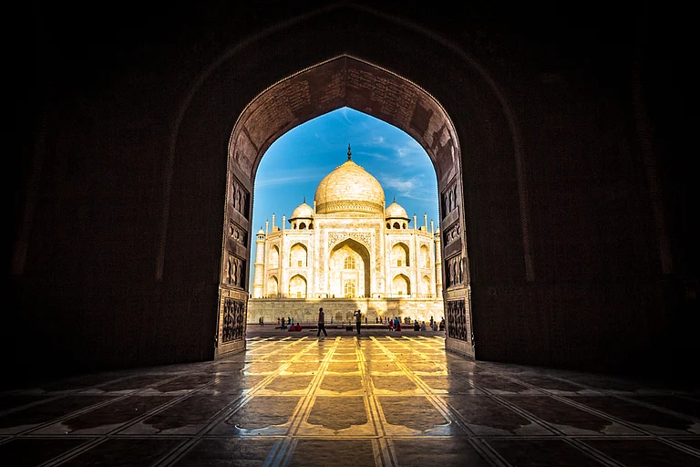The ivory-white marble Taj Mahal is located on the banks of the Yamuna river in Uttar Pradesh - Ultimate Travel Photos/Shutterstock