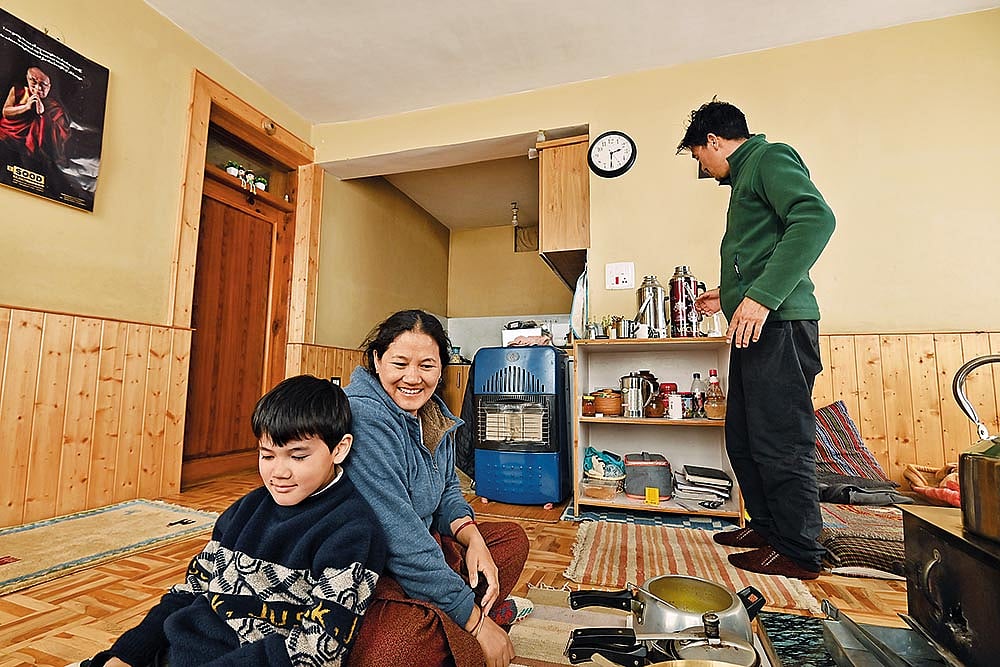 Fa-Ma Home Stay hosts Kulzang Uma and Thuktan Chhopal with son Nima