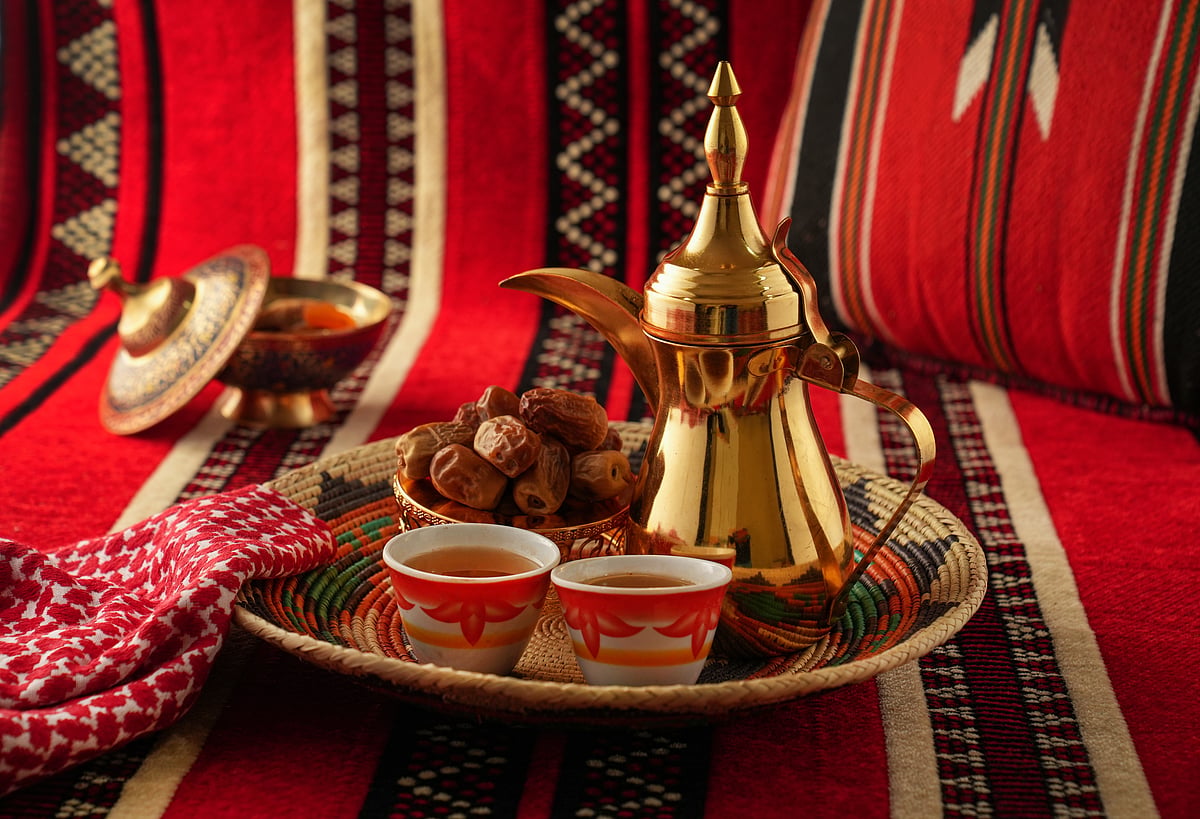 A traditional Emirati coffeepot and teacups make for a beautiful souvenir
