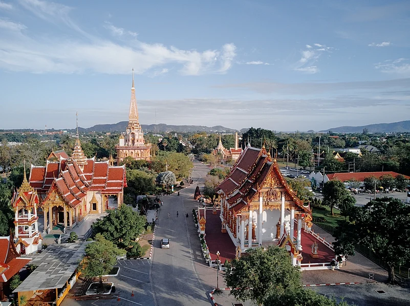 Drone shot of The Wat Chalong Buddhist temple in Chalong, Phuket, Thailand