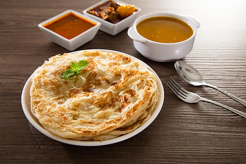 Roti canai with lamb curry sauce