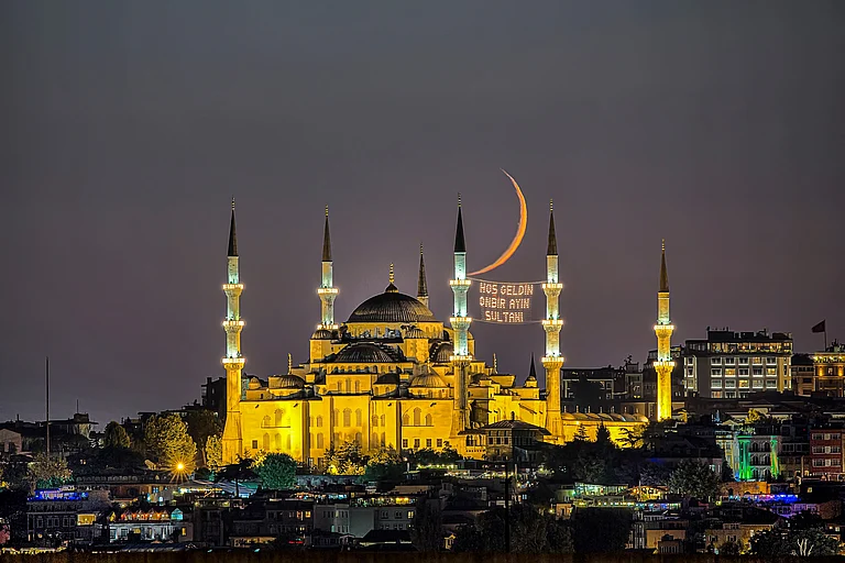 The crescent of Eid seen behind the the Blue Mosque, Turkey (representational image) - Shutterstock