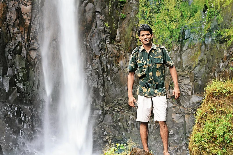 One of the naturalists at a waterfall