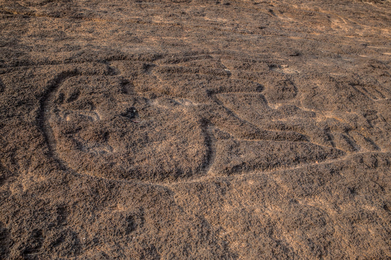 Rock cravings older than 9000 years at the Usgalimal stone slab in Goa